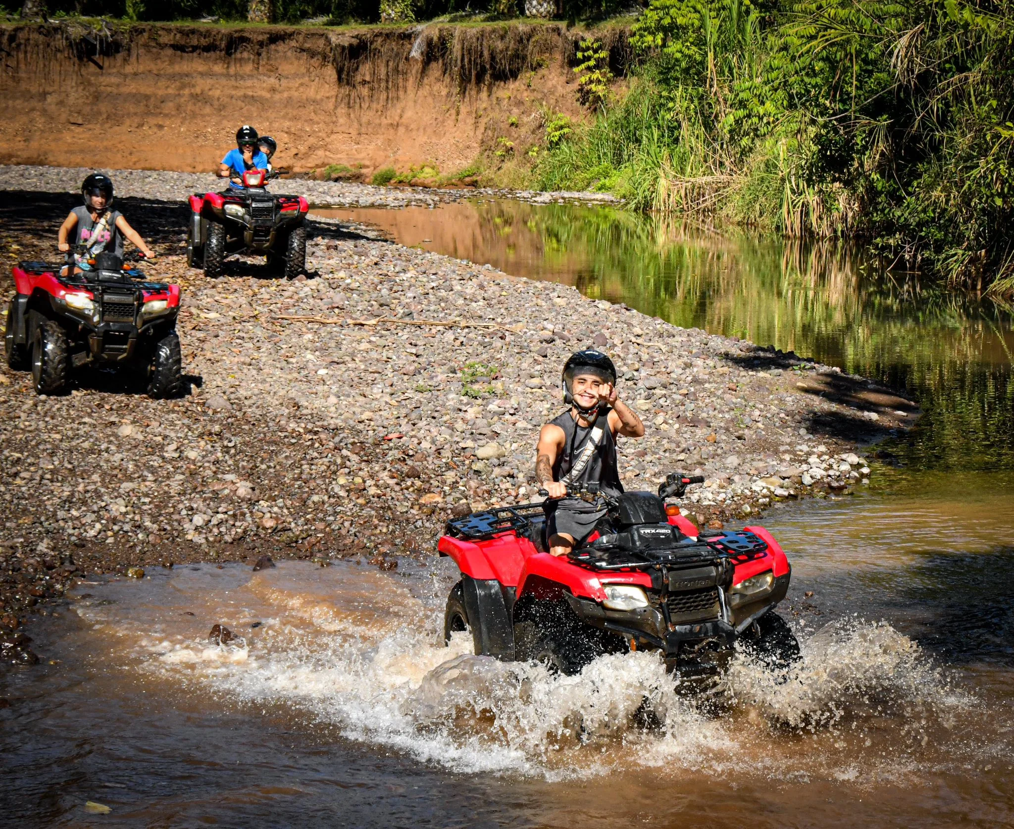 ATV tour Manuel Antonio Costa Rica — off-road adventure through jungle and palm plantations near Quepos